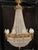 Monumental Classicist ceiling chandelier, crystal brass Impressive chandelier, richly faceted. Wide body with 12 light...