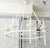 White Bespoke Eight Arm Plaster Fixture in the Manner of Giacometti For Sale - Image 8 of 10