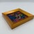 Small in scale but exuberant in color, this vintage floral still life features a densely layered bouquet of stylized...