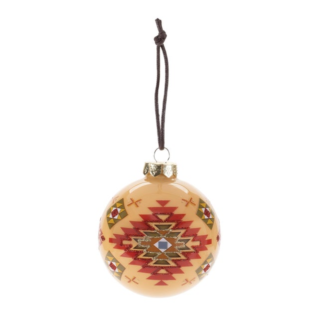 Bring the warmth of the West into your holiday decor with the Western Glass Ball Ornament. Featuring festive red and green...