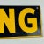 American Vintage "Warning" Enamel Sign in School Bus Yellow, and Black For Sale - Image 3 of 7