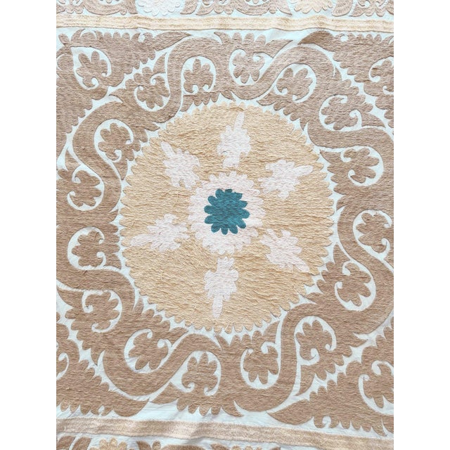Decorative Vintage Suzani from Samarkand, circa mid-1960s. There are stains on this suzani. Dimension; 50'' x 53'' inches...