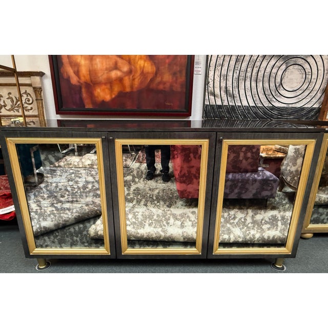 Design Plus Gallery presents a Custom Design Sideboard from Mark David. This substantial case piece pairs a smoked glass...