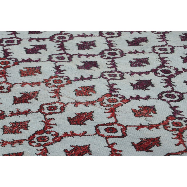 Made with hand-knotted wool in Turkey circa 1960-1970, this 4x9 vintage rug is an exciting new addition to Rug & Kilim’s...