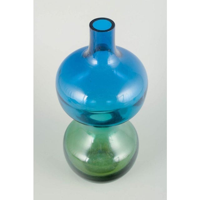 Scandinavian studio glass Large art glass vase, 1970s. Mouth-blown Scandinavian studio glass with a graduated colour...