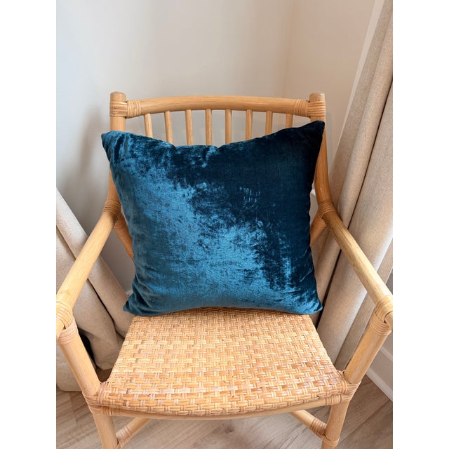 Elegant and versatile, this deep teal velvet throw pillow brings rich color and soft texture to any space. The plush...