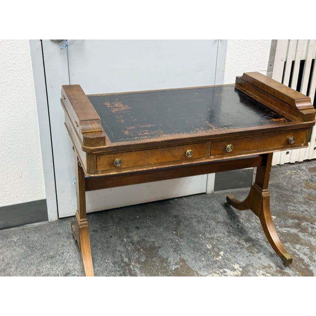 Design Plus Gallery presents a Writing Desk from Sahon Furniture of New York. This vintage table is made from solid wood...