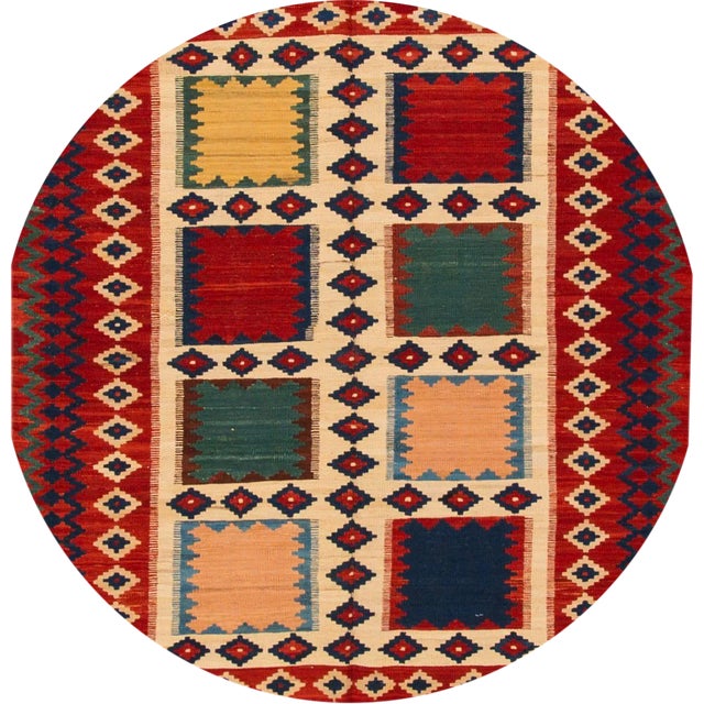 Modern hand-knotted kilim rug with a geometric motif. This piece has great detailing and a beautiful design. It would be...