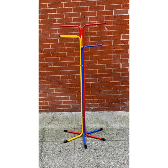 Rare, awesome vintage 1980s Ikea bent metal coat stand. Clean design and fun primary colors. This coat rack features six...