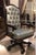 Commanding and sophisticated, this high-back executive chair brings timeless elegance to a home office, library, or...