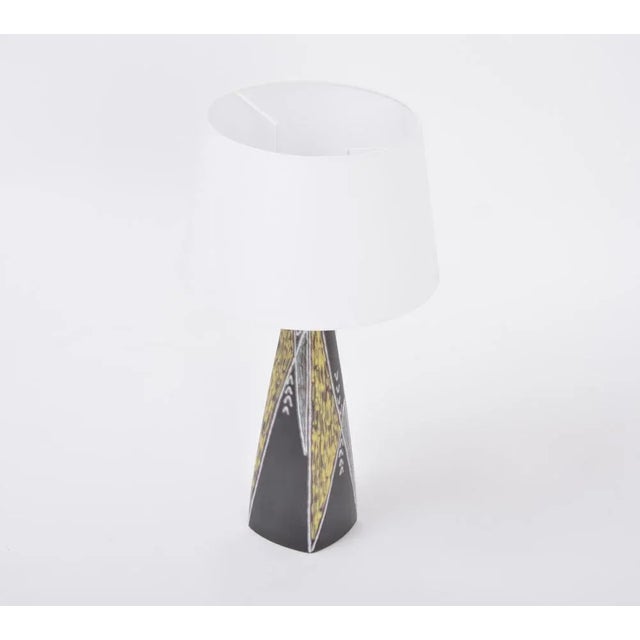 Beautiful tall table lamp designed by Holm Sørensen and Svend Aage Jensen in 1955 for Søholm, Denmark. The design is from...