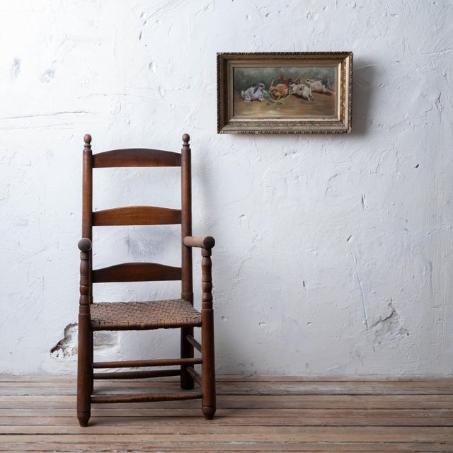 An American school oil on canvas depicting bunny rabbits eating ruffage, late 19th century. canvas: 16 by 8 inches frame:...