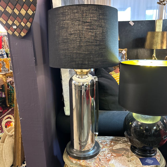 Chrome lamp that is a repurposed and professionally restored fire extinguisher. It had been painted and it was removed...