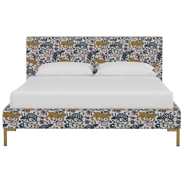 This low profile fully upholstered platform bed is a perfect piece for anyone looking to add a modern statement piece to...