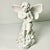 This figurine is a Garden Angle sitting atop morning glories with wings spread wide and holding a flora bloom in each...