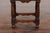 An Italian petite carved walnut side table with single drawer, geometrical motifs, unusual fluted legs and side stretchers...