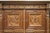 This amazing carved cabinet was imported from France. It has 4 doors. The top two doors open by pulling down and sliding...
