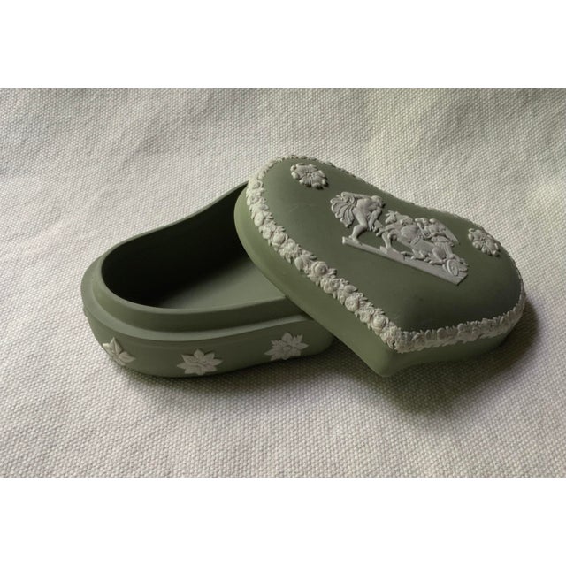 Condition: Very Good | Period: 1950s | Material: Green Jasperware with White Relief Description Prepare to fall head over...