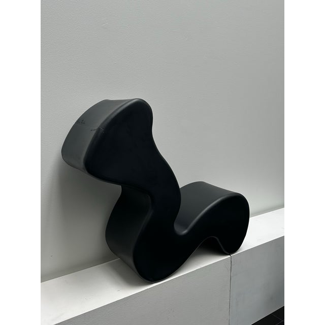 A fluid, sculptural lounge piece by Verner Panton, originally conceived as an experimental exploration of organic form and...