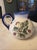 The W.R. Ceramika Unikat "Strawberries and Blossoms" Polish Pottery Pitcher is a beautifully hand-painted ceramic pitcher...