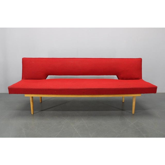 This Mid Century Modern sofa / daybed was designed by Miroslav Navrátil and produced in Czechoslovakia during the 1960s. A...