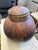 Impressive in scale, large hand made organic hollowed out dried gourd vessel with lid and wood. Visible stitching and...