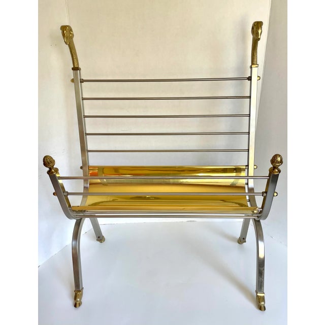 Here is a STUNNING piece that is in the style of Maison Jansen, featuring steel and brass details. Please note the...