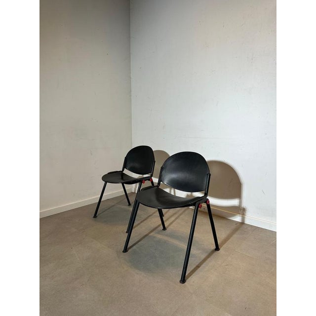 These chairs feature a curved ergonomic seat and backrest made from durable molded material, providing comfort while...