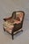 This is a wonderfully re-upholstered cane lounge chair. The arms and back are in near perfect condition and with the new...