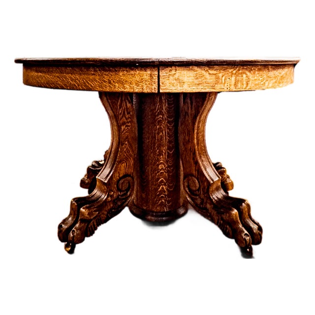 Early 20th Century Solid Oak Clawfoot Dining Table With Four Leaves For Sale