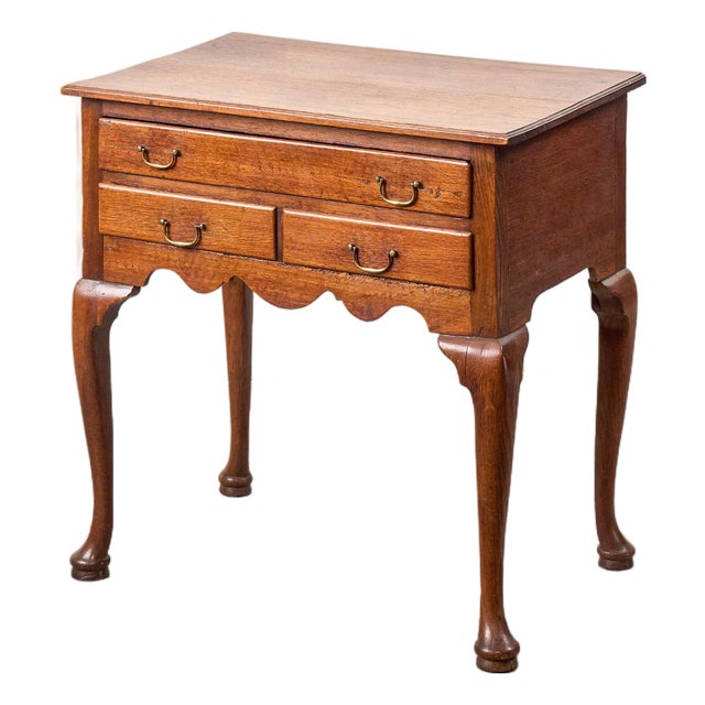 Early 19th Century Georgian Oak Lowboy With Original Swan Pulls For Sale