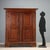 Baroque cherry wardrobe from Piacenza, dating back to the first half of the 18th century. The front features a pair of...