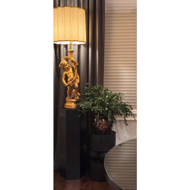 Gloss black finish with triple-toned gold gilt all-over floral motif pattern and central figural design. Featuring early...