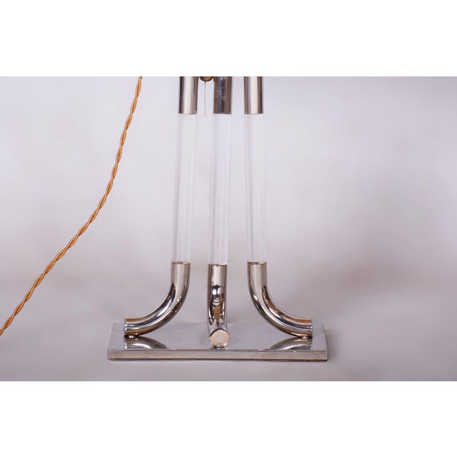 This table lamp is a prime example of 1970s italian design, embodying the luxurious and bold aesthetic of the late mid-...