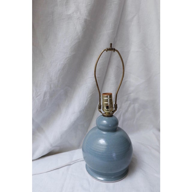 From the personal collection of Montana pottery instructor. The dusty blue hue adds soft saturation to a space while the...