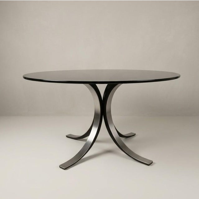 T69 Table by Osvaldo Borsani and Four Wheeled Chairs by Eugenio Gerli for Tecno, 1960s, Set of 5, in Good conditions....