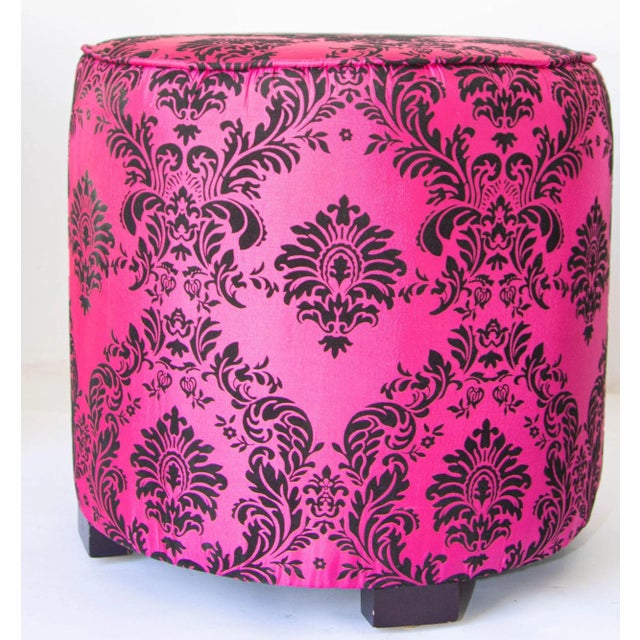 Post Modern style fuchsia and black Moroccan upholstered stools, round ottoman or vanity stool in hot fuchsia color with...