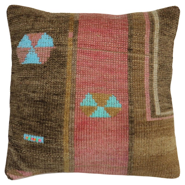 Pillow made from a mid 20th century Turkish rug. Foam and zipper closure provided Measures: 20'' x 20''.