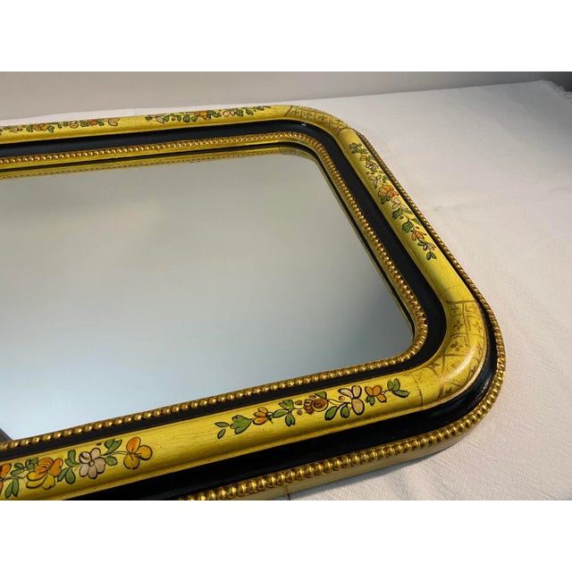 Wonderful vintage LaBarge wall mirror. Made of wood and features a hand painted floral design with gilt accents.