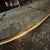 A solid brass wall mirror designed and manufactured in Italy in the manner of Gio Ponti who used this type of mirror in...