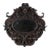 Early 20th Century Carved Oval Dark Oak Mirror From Portugal For Sale