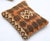 A one-of-a-kind handwoven Afghan wool kilim lumbar pillow featuring rosette border with a central medallion. Cut and sewn...