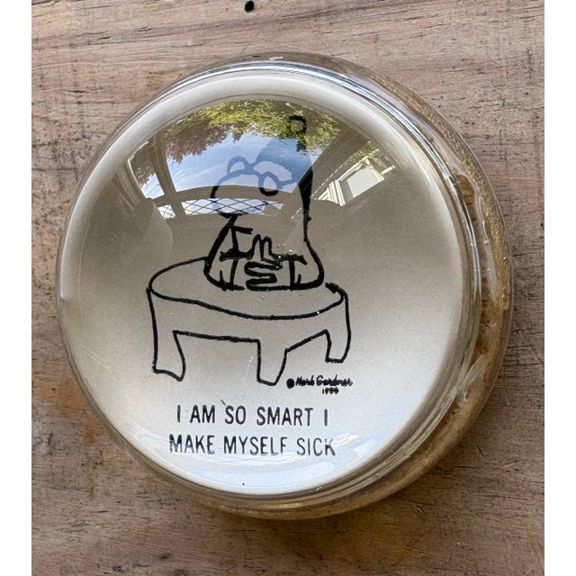Vintage glass paperweight featuring the humorous cartoon “I Am So Smart I Make Myself Sick” by American cartoonist Herb...