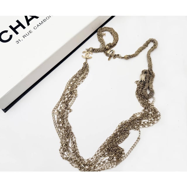 Chanel Light Gold CC Braid Multi Chain CC Dangle Long Necklace *Marked 10 *Made in France *Comes with the original box -It...