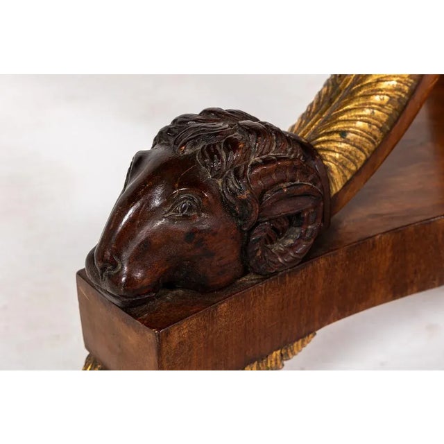 A Fine Quality Early 19th Century Italian Centre Table with Rams Head Detailing. This lovely Italian table combines...