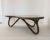 This beautiful, rare table is from the 60s. The bamboo base, frame is on a pretzel design and the top is laminated. This...