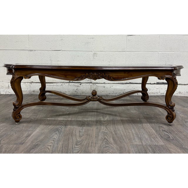This is a gorgeous vintage Karges Louis XV style hand carved burled walnut coffee table or cocktail table with beveled...