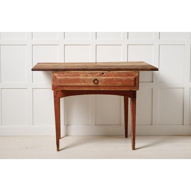 Late 1700s side table from northern Sweden. This folk art antique is made by hand in solid pine and is in original...