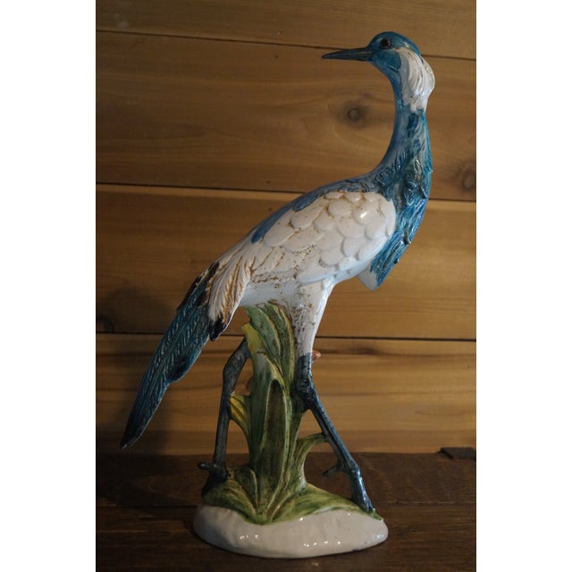A lovely Italian ceramic heron statue which is marked on the bottom and in very good condition. Measures 18.5 inches x 12...