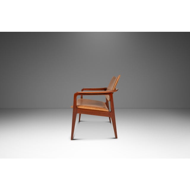 This rare and elegant pair of Model 132 accent chairs was designed by Sigvard Bernadotte for France & Son (France &...